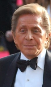 Valentino Garavani in a tuxedo at a formal event