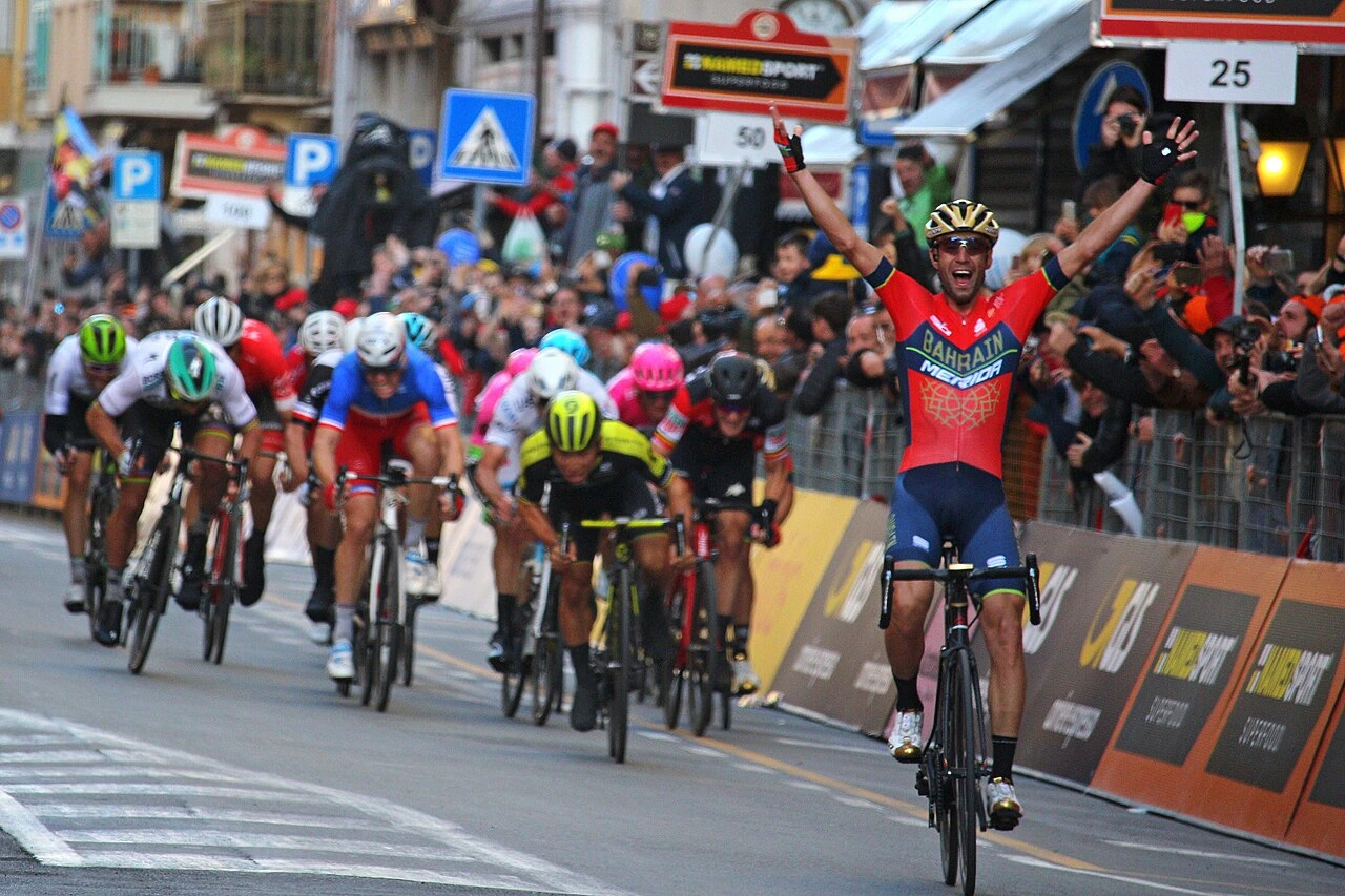 Vincenzo Nibali celebrating victory at Milano-Sanremo 2018 in a road cycling race.